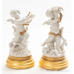 Pareja de figuras de Algora en porcelana blanca y dorada