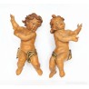 Pareja de figuras en madera tallada, policromada y dorada, niños
