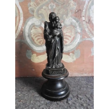 Figura de bronce de San José con el niño sobre peana de madera