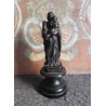 Figura de bronce de San José con el niño sobre peana de madera