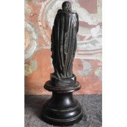 Figura de bronce de San José con el niño sobre peana de madera