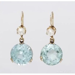 Conjunto de sortija y pendientes de oro 14K con espinelas sintéticas